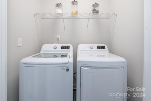 laundry area featuring washing machine and dryer