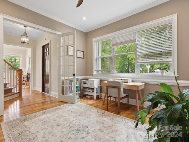 home office featuring a chandelier, crown molding, french doors, and wood-type flooring