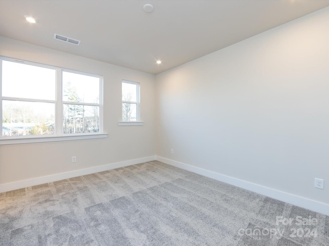 1530 Levy Way, Charlotte, NC 28205 - spare room with light carpet and recessed lighting