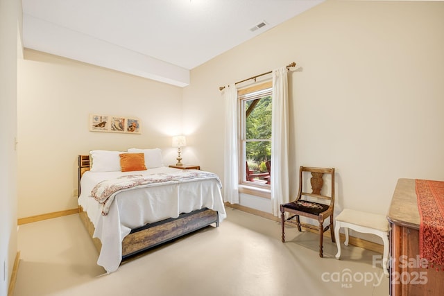 bedroom featuring visible vents and baseboards