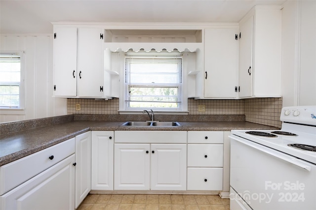 kitchen featuring decorative backsplash, sink, white cabinets, and white electric range oven