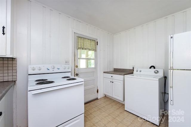 kitchen featuring white cabinets, washer / clothes dryer, and white appliances