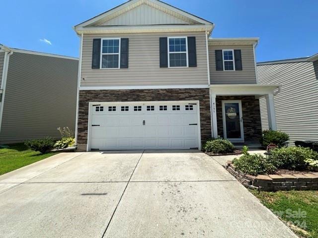 view of front of home featuring a garage