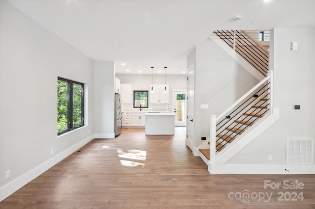 interior space with light hardwood / wood-style flooring