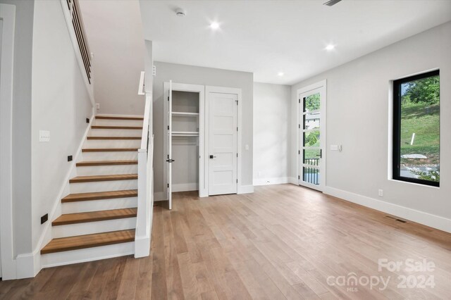 foyer with light wood-type flooring