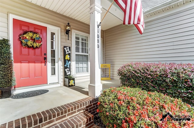 entrance to property with a porch