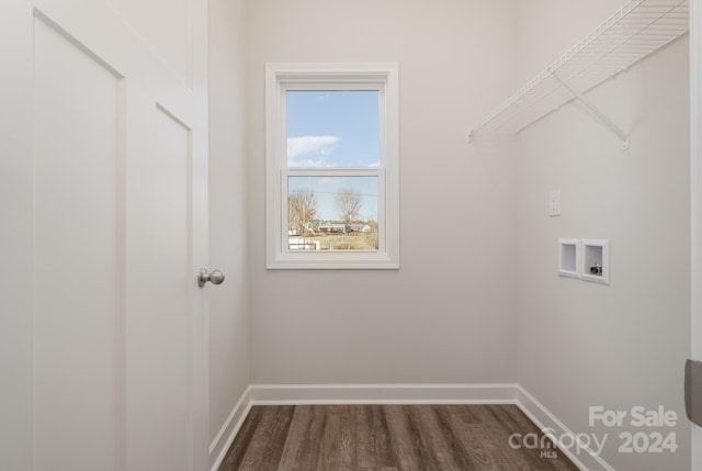 laundry area with hardwood / wood-style flooring and washer hookup