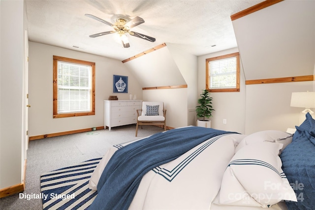 carpeted bedroom featuring ceiling fan and lofted ceiling