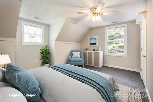 bedroom featuring carpet, ceiling fan, and vaulted ceiling