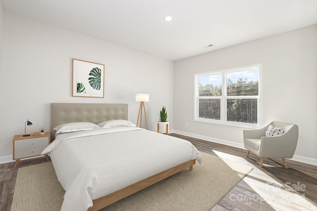 bedroom with wood-type flooring