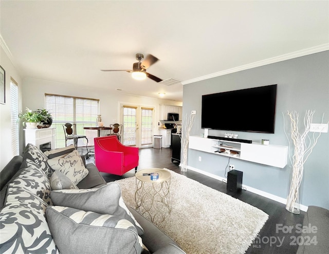 living room featuring crown molding, ceiling fan, and french doors