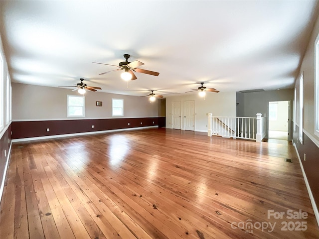 spare room with hardwood / wood-style floors