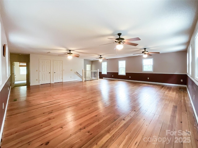 unfurnished living room featuring light hardwood / wood-style floors