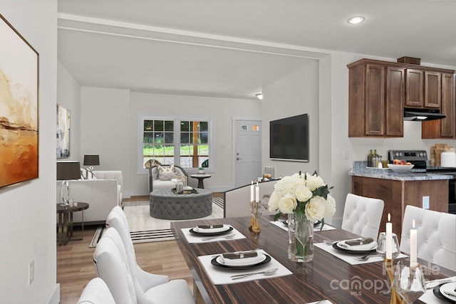 dining area featuring light wood-type flooring