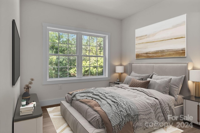 bedroom featuring hardwood / wood-style flooring