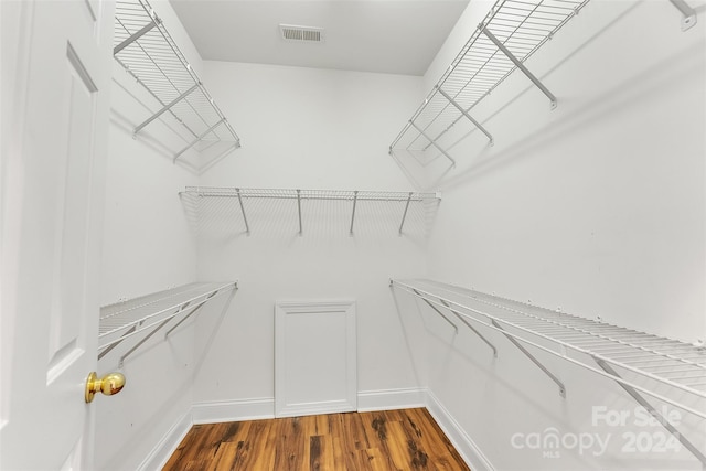 spacious closet featuring wood-type flooring