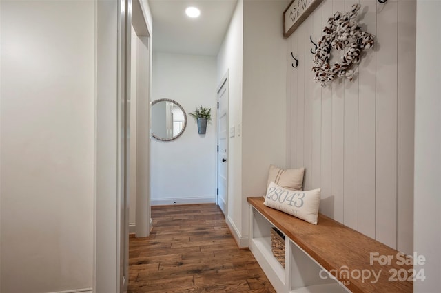 mudroom with dark hardwood / wood-style floors