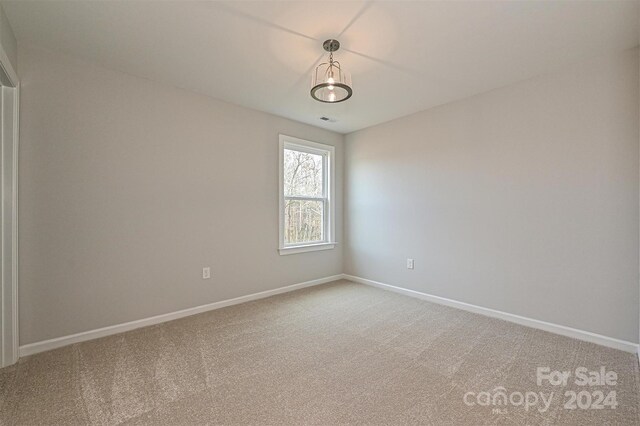 view of carpeted spare room