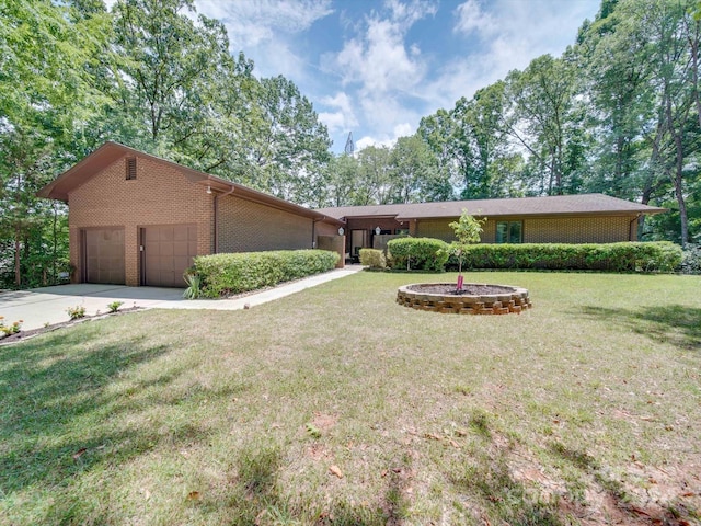 single story home featuring a front yard and a garage