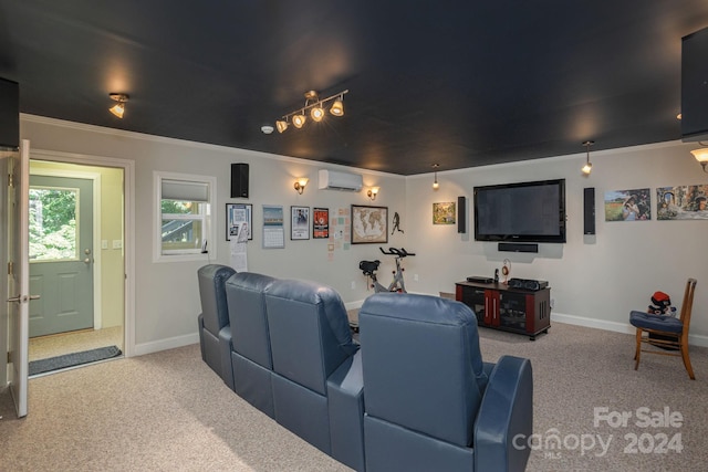 carpeted home theater room with an AC wall unit and ornamental molding