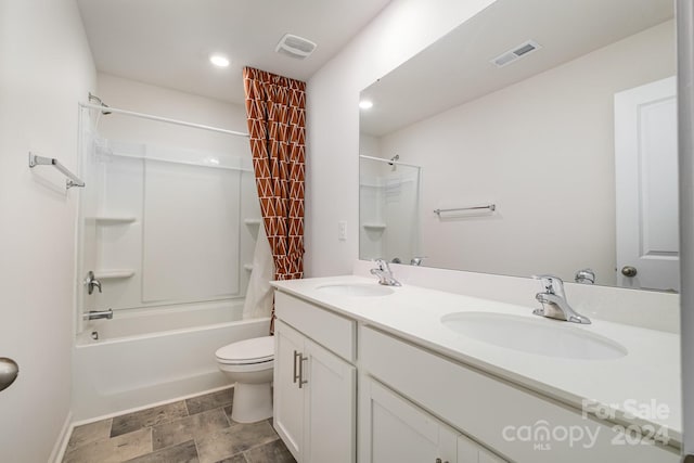 full bathroom with toilet, vanity, and bathtub / shower combination