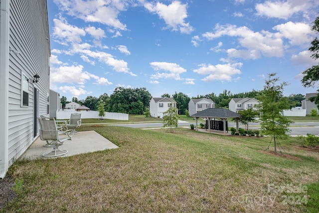 view of yard with a gazebo and a patio