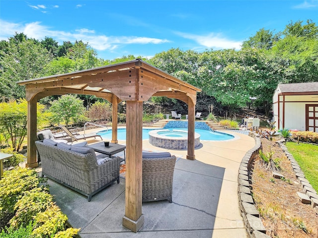 view of swimming pool featuring a patio and an in ground hot tub