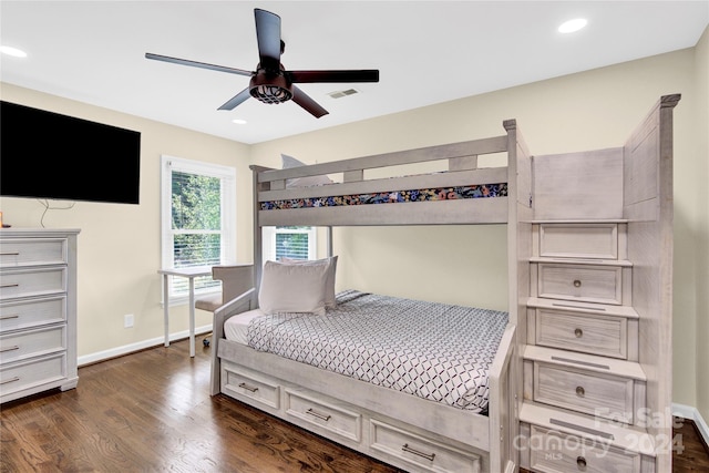 bedroom featuring ceiling fan and dark wood-type flooring