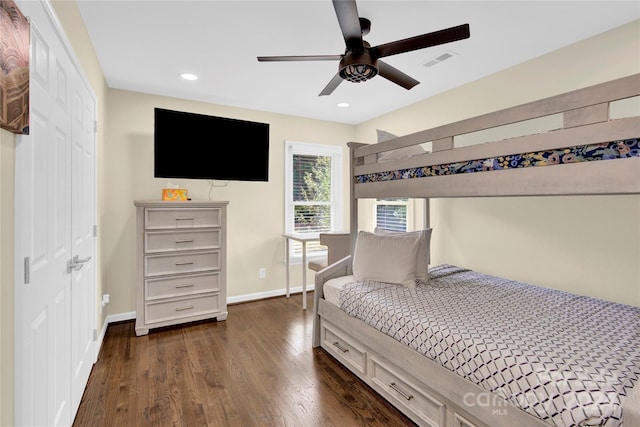 bedroom featuring ceiling fan and dark wood-type flooring