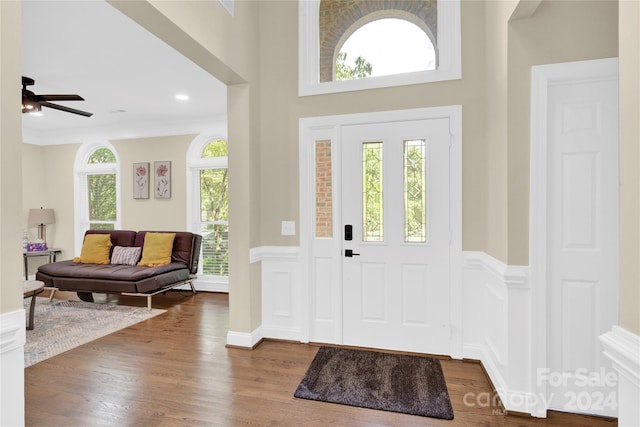 foyer entrance featuring ceiling fan and hardwood / wood-style floors