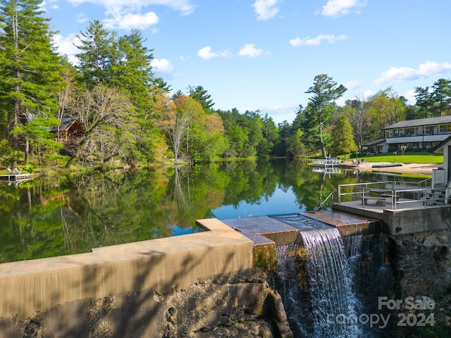 view of dock with a water view