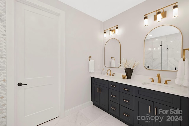 bathroom featuring a shower and vanity