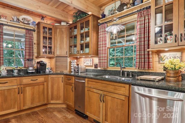 kitchen with wood ceiling, hardwood / wood-style floors, beam ceiling, stainless steel dishwasher, and sink