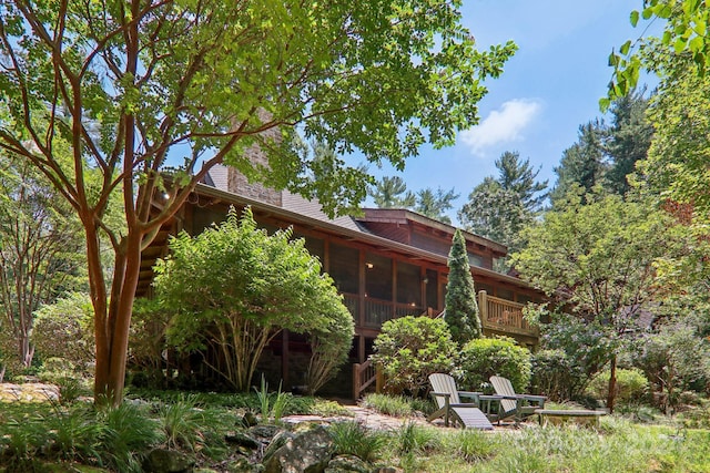 view of yard with a sunroom