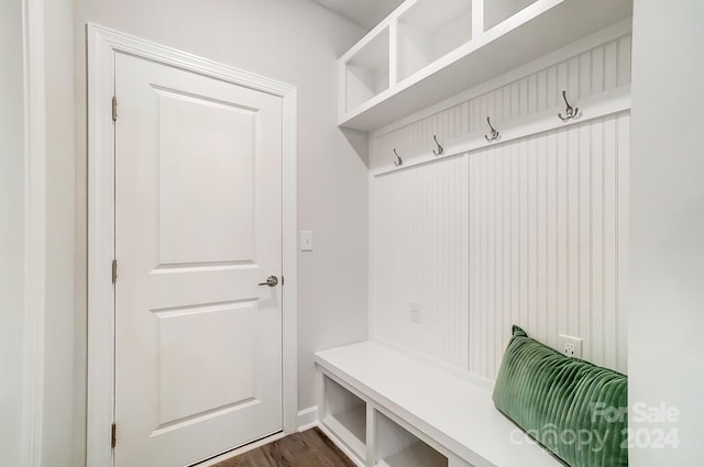 mudroom with dark hardwood / wood-style floors