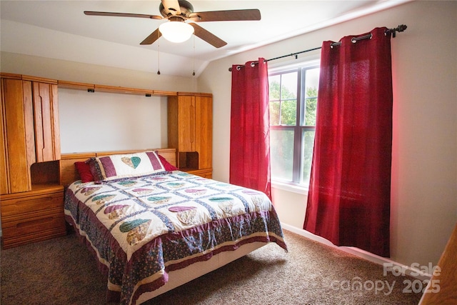 carpeted bedroom featuring vaulted ceiling and ceiling fan