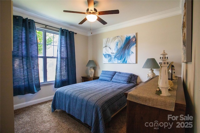 carpeted bedroom featuring ceiling fan and ornamental molding