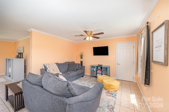 tiled living room featuring ceiling fan and ornamental molding