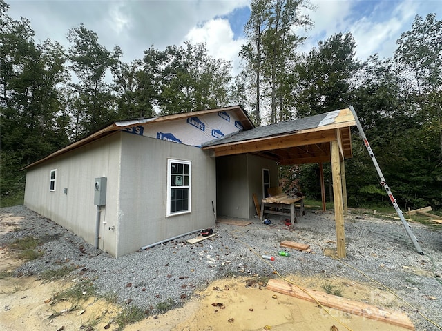 view of front of house with a carport