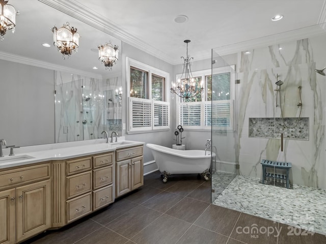 bathroom with vanity, ornamental molding, a notable chandelier, and shower with separate bathtub