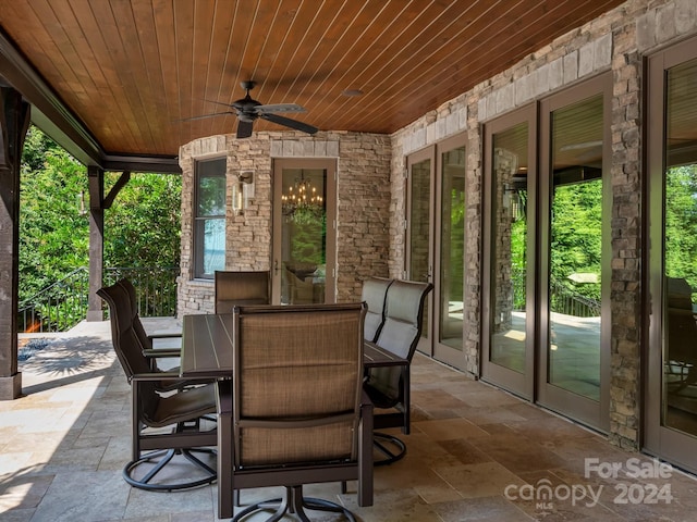 view of patio / terrace featuring ceiling fan