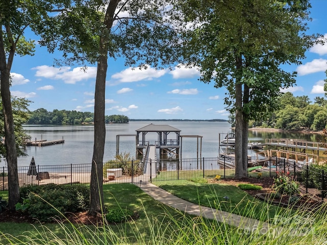 dock area with a water view