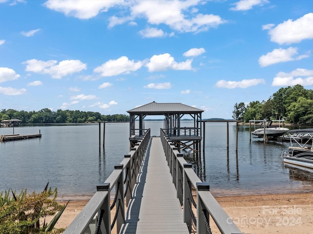 dock area with a water view