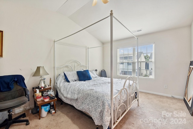 carpeted bedroom with ceiling fan and lofted ceiling