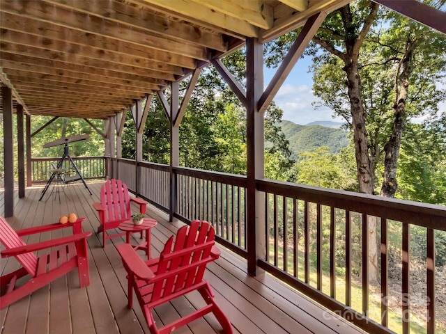 wooden terrace featuring a mountain view