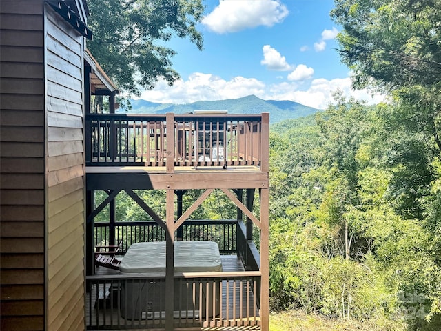 wooden terrace featuring a mountain view