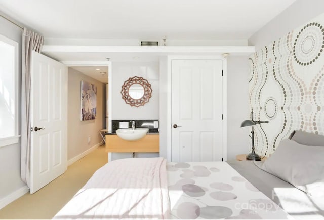 bedroom featuring sink