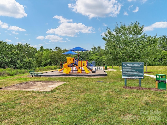 view of play area featuring a yard