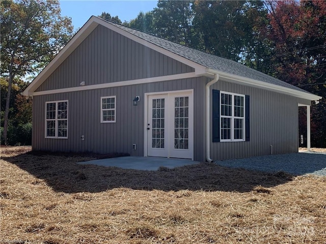 rear view of property featuring a patio area