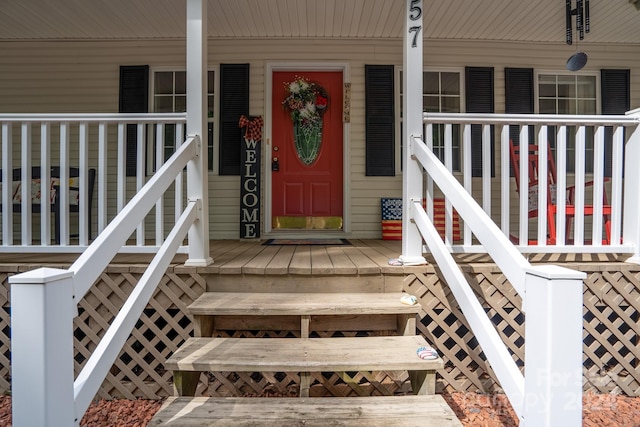 entrance to property featuring covered porch